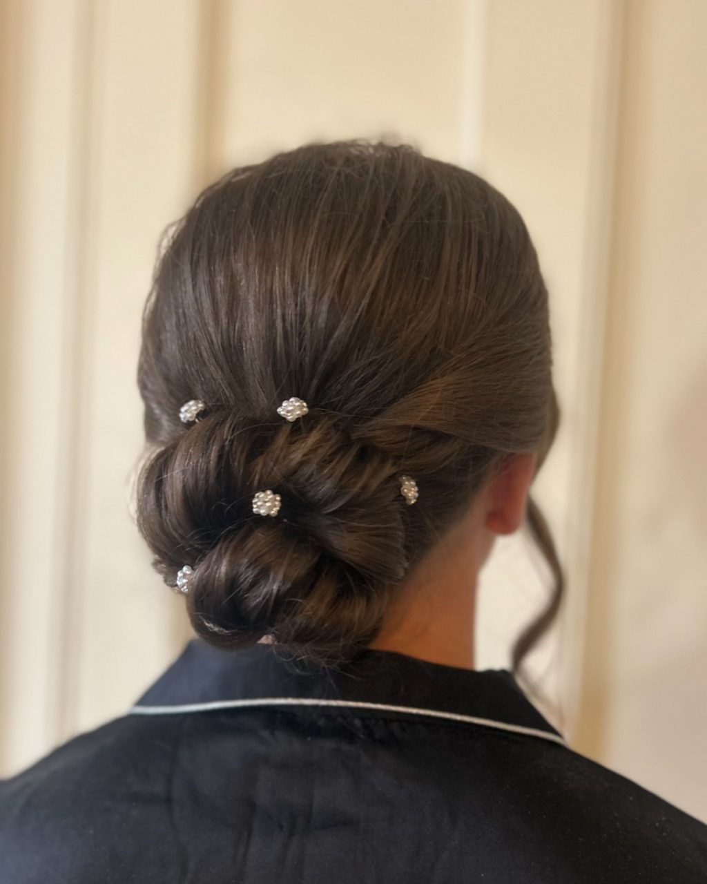 Instagram post from clairewoodmassbridalhair. This post is in position 2.