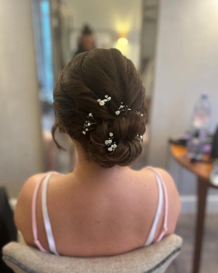 Instagram post from clairewoodmassbridalhair. This post is in position 7.