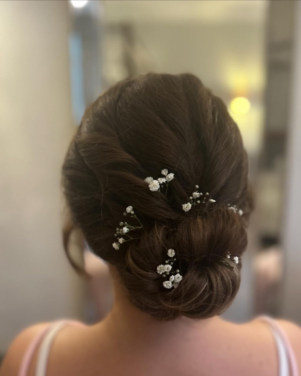 Instagram post from clairewoodmassbridalhair. This post is in position 2.