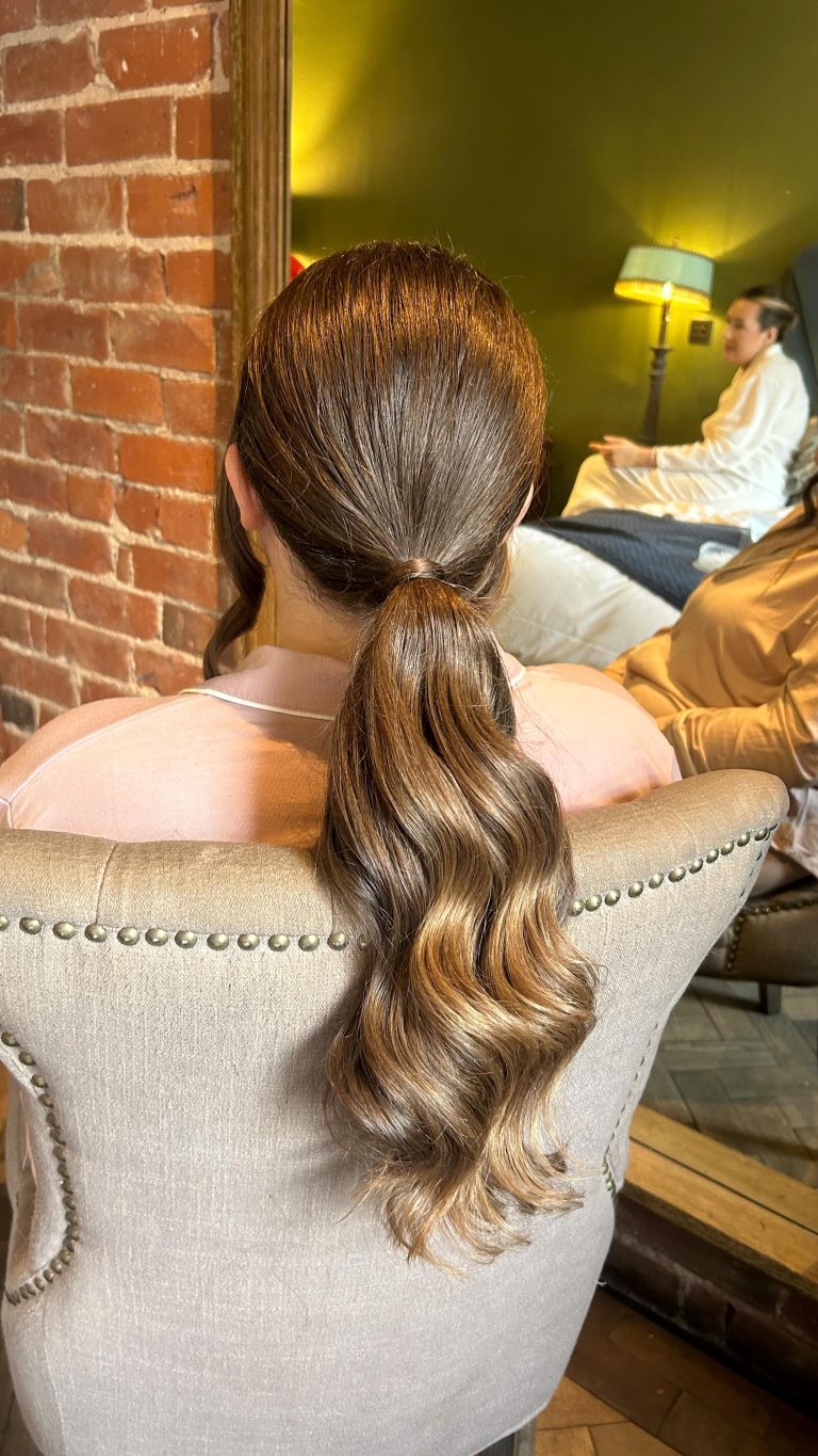 Instagram post from clairewoodmassbridalhair. This post is in position 22.