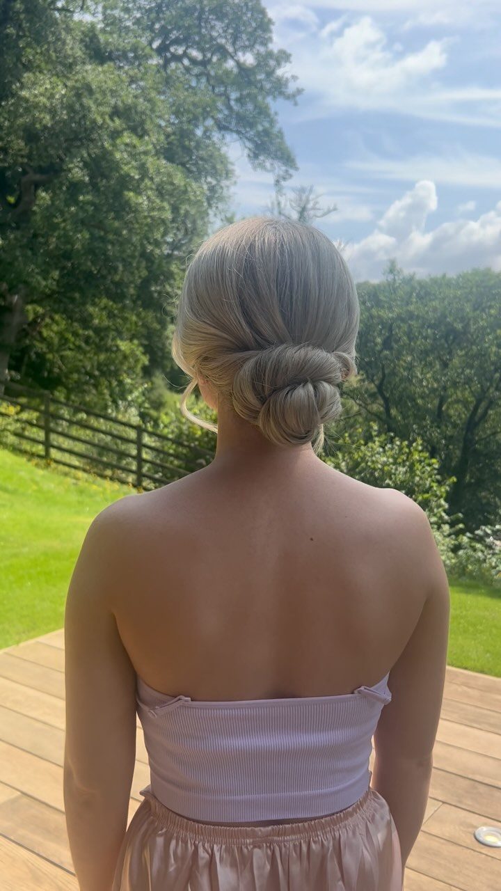 Instagram post from clairewoodmassbridalhair. This post is in position 10.