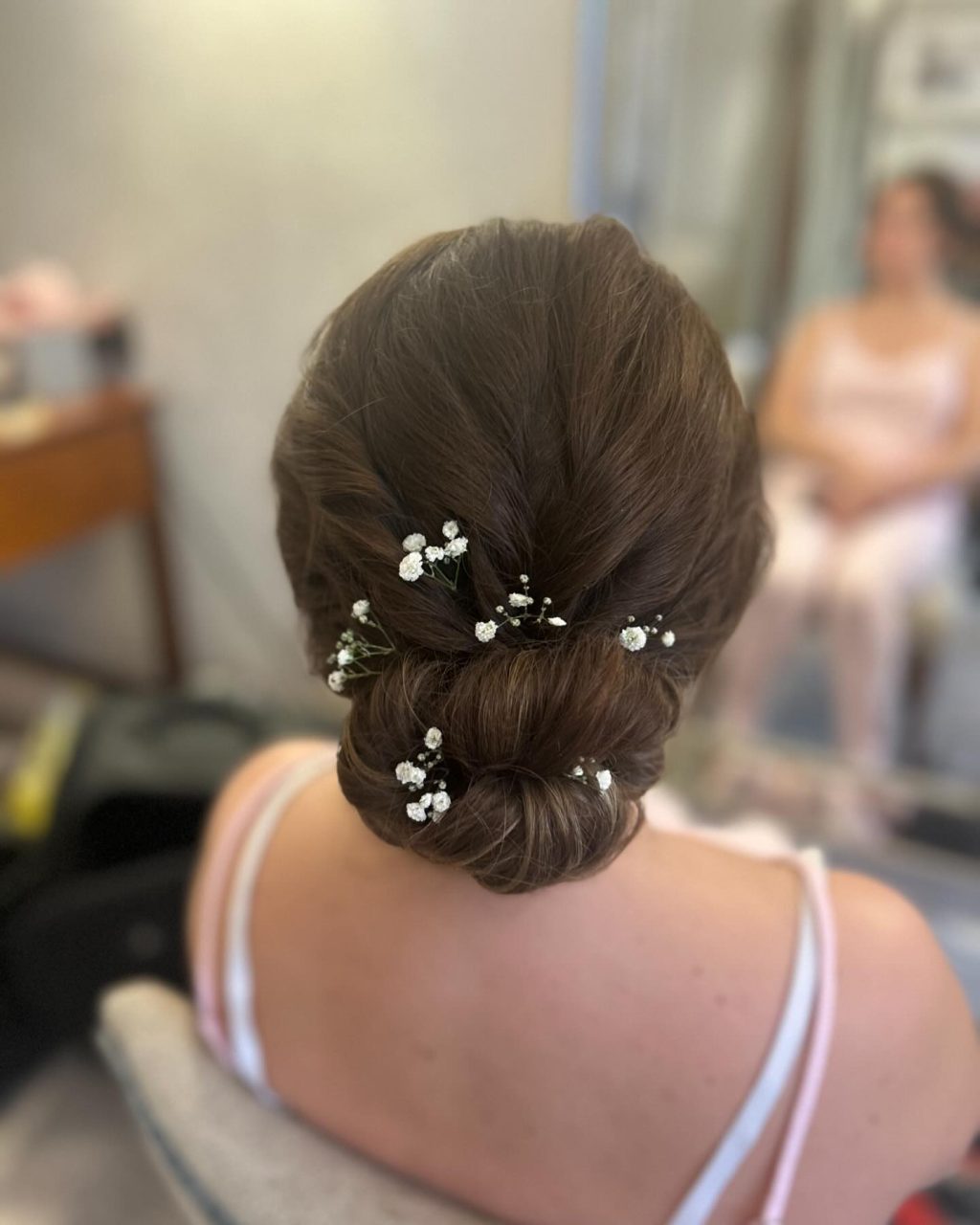 Instagram post from clairewoodmassbridalhair. This post is in position 1.